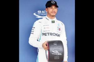 Japanese GP: Lewis Hamilton takes pole position