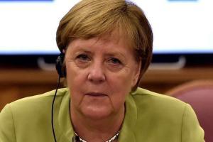 Angela Merkel says planned exit won't hurt her influence abroad