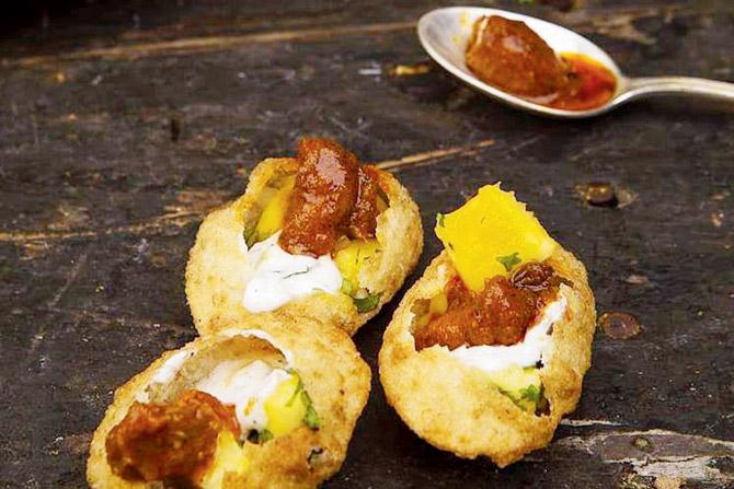 Pani Puris featuring a pickle