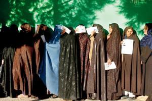 On day two of Afghan polls, roadside blast kills eleven
