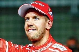 Ferrari's Vettel livid after grid penalty, says rules are wrong