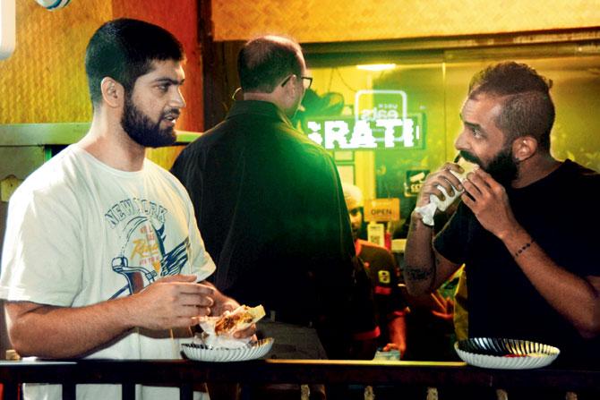 Locals in Versova enjoying the Middle Eastern snack