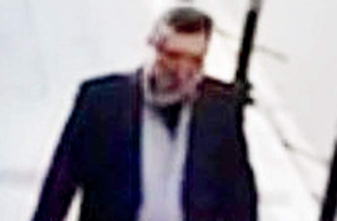 His alleged body double. Pics/AFP, CNN