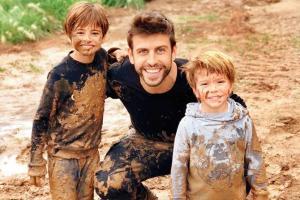 Barca's Pique trolled online for 'mud' picture with sons