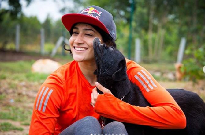 Ashwini Ponnappa has always been fond of dogs, she captioned this picture, #throwback From my day at the best dog home/shelter/farm ever #voiceofstraydogs @vosd.in, Love how every single dog that goes there,no matter what shape,size,injury or disability they may have,each and every one of them is given a home and no dog is put to sleep.They are given a chance to lead a happy,healthy life I love how happy the dogs there are!!Its just such an amazing place!!#voiceofstraydogs is most definitely my happy place #happyplace #bestplacernIt isn't the slightest bit easy to run a place which is a home for more than 800 dogs!!!!!All credit to the man who believed in it,started it and single handedly runs it #rakeshshukla @vosd.in .Happy that there is someone like him out there who's doing everything he can for dogs.Hats off to you Rakesh #voiceofstraydogs #vosd #dogshelter #dogparadise #dogs#dogsofinstagram #adoptdontshop Thank you @manviraophotography for the photos