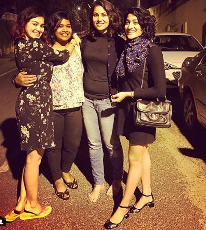 In picture: Ashwini Ponnappa looks dazzling in a short black dress and a scarf on a dinner party with friends.