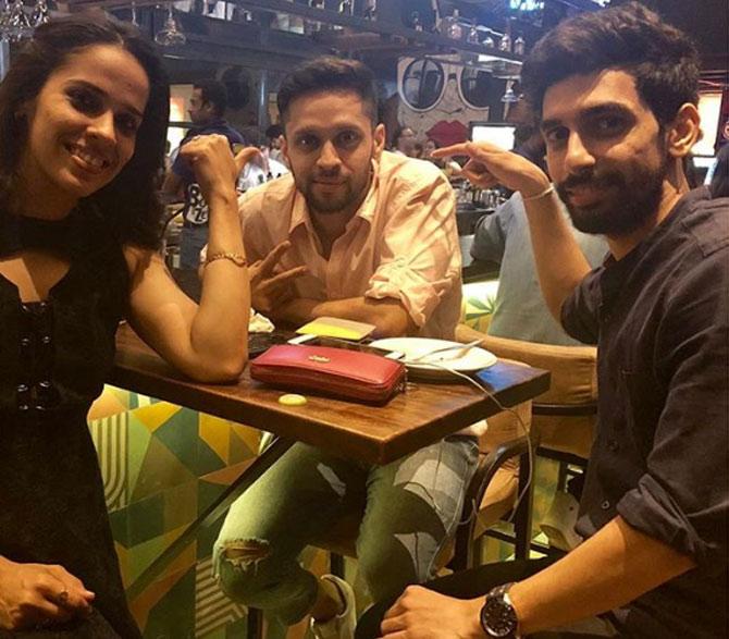 In picture: Saina Nehwal with Parupalli Kashyap and Gurusai Dutt on Kashyap's birthday