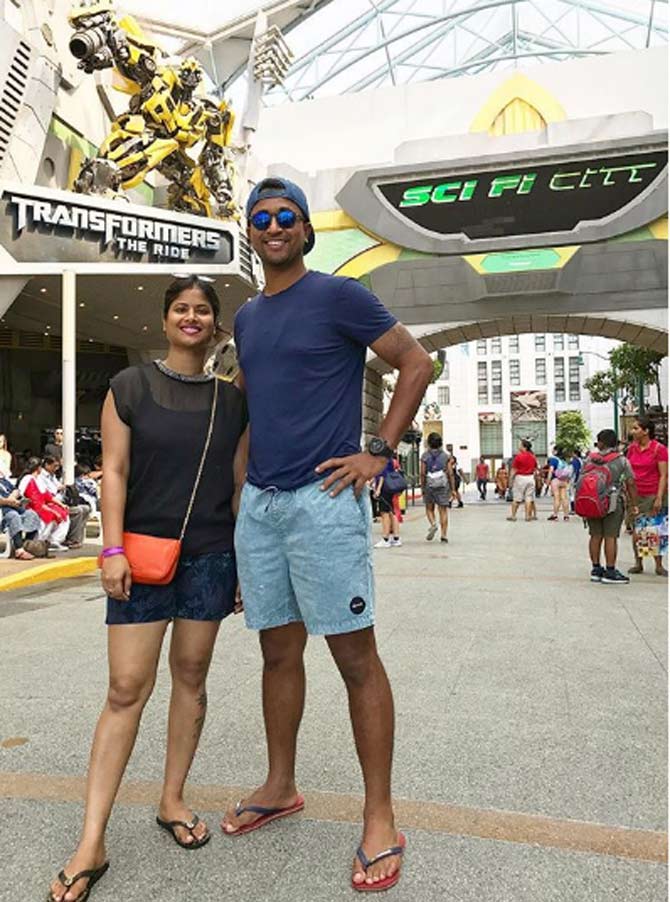 Pragyan Ojha achieved World no 5 as his career-best ranking in ICC Player Rankings. He is also the only spinner to win the Purple Cap in the Indian Premier League. In picture: Pragyan Ojha and Karabi Baral at the Universal Studios
