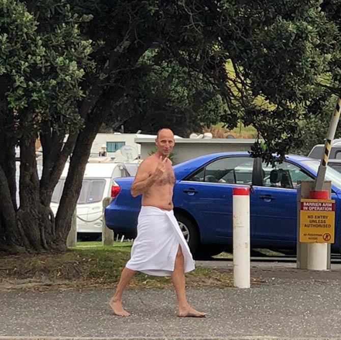 Jos Buttler shared this picture of an almost naked Nasser Hussain walking on the streets of a holiday destination in New Zealand. He captioned, 'Former England cricket captain on the loose in Mt Maunganui'