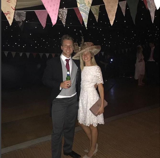 Jos Buttler pictured with wife Louise Buttler at a friend's wedding ceremony. He captioned, 'Had a great day at John and Sophie's wedding! Congratulations guys. @louisekwebber #mrandmrsfarrington'