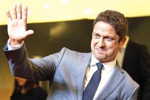 Gerard Butler puts on loved-up display with girlfriend