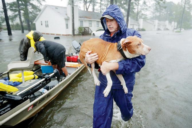 Donald Trump has declared a disaster in North Carolina. Pics/AFP