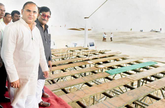 Tourism minister Jaykumar Rawal shows the stage built for foreign tourists at Girgaum Chowpatty 