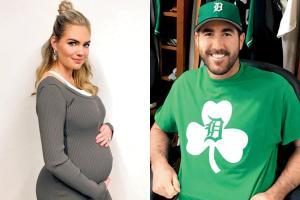 Pregnant model Kate Upton does light weight exercises to stay fit