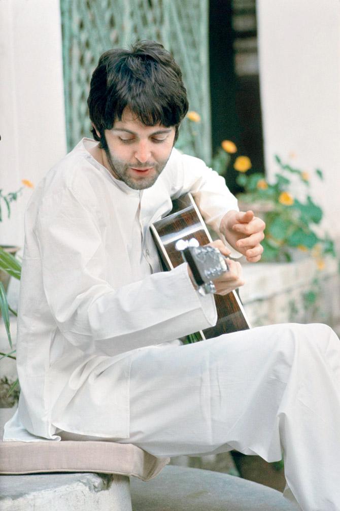Paul McCartney looks down at words he had scribbled on a scrap of paper. It was the refrain to Ob-La-Di, Ob-La-Da