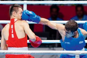 Boxer Amit Panghal beats the odds and punches his way to a gold