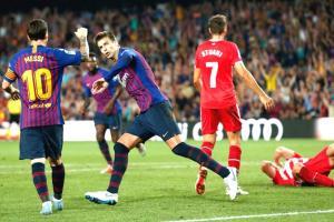 La Liga: Pique rescues point for 10-man Barca against Girona