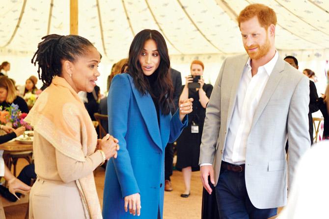 Meghan, Duchess of Sussex (centre) arrives with her mother Doria Ragland and Prince Harry at the launch. Pic/Getty Images