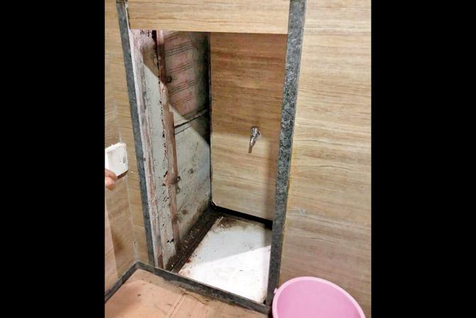 Nine of the girls were crammed into a dank, windowless cavity behind the bathroom