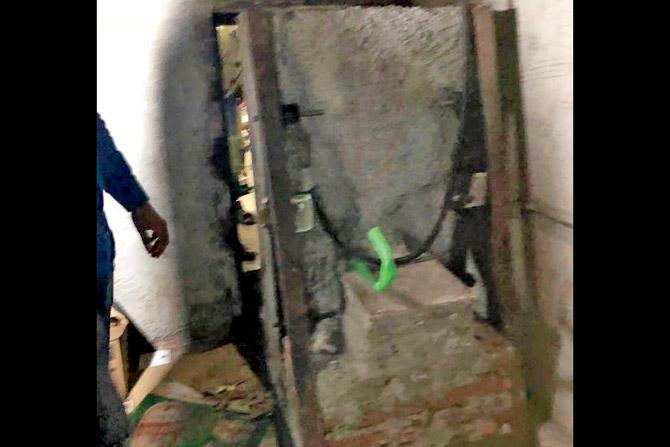 Nine of the girls were crammed into a dank, windowless cavity behind the bathroom