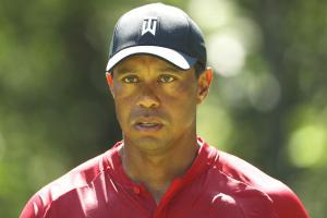 Tiger Woods shoots 68, moves to tied 16th as Ancer leads