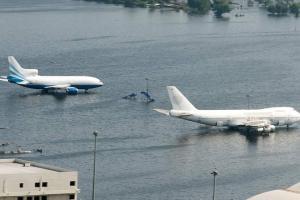 Strong typhoon slams western Japan; 8 dead, airport flooded