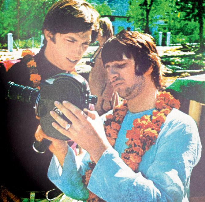Ringo Starr shows Satlzman (left) how to use his camera for a film he wanted him to shoot