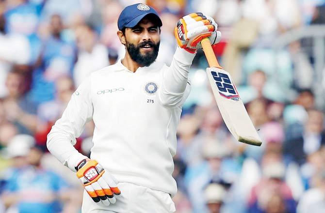 Jadeja celebrates his 50. Pic/AFP