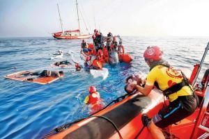 Humanitarian group says 100 migrants die off Libyan coast
