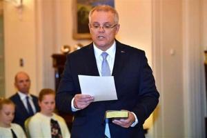 Australian PM Morrison apologizes for using explicit song in video