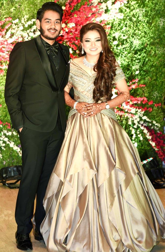 Producer of a popular production house, Jayantilal Gada held a wedding reception for his son, Akshay Gada, at a plush hotel in Andheri, Mumbai. In picture: Akshay Gada posed with wife Murup at the ceremony. All pictures/Yogen Shah