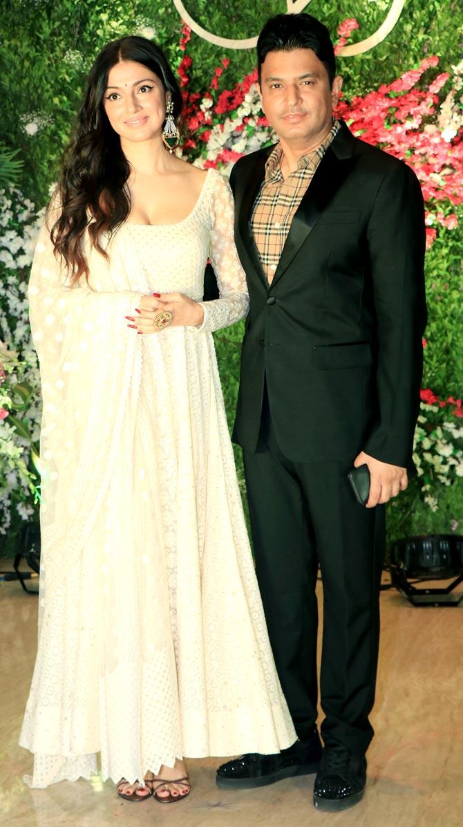 Divya Khosla Kumar attended the wedding reception ceremony of Jayantilal Gada's son with husband Bhushan Kumar which was held at a plush hotel in Andheri, Mumbai.