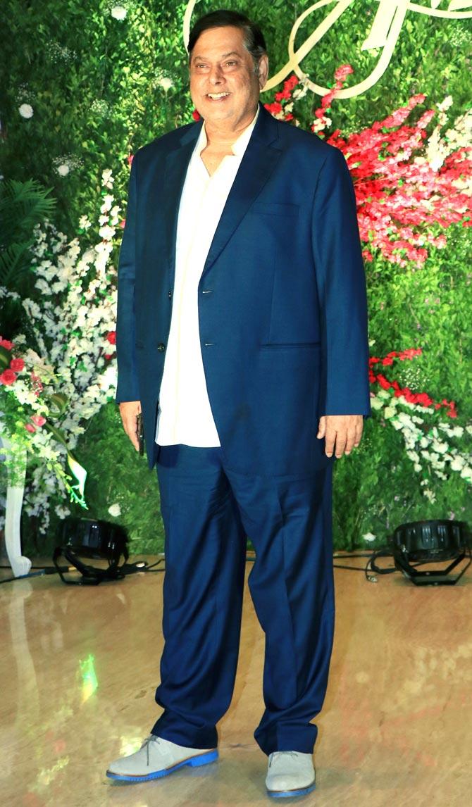 David Dhawan opted for a blue suit to attend Akshay Gada's wedding reception.