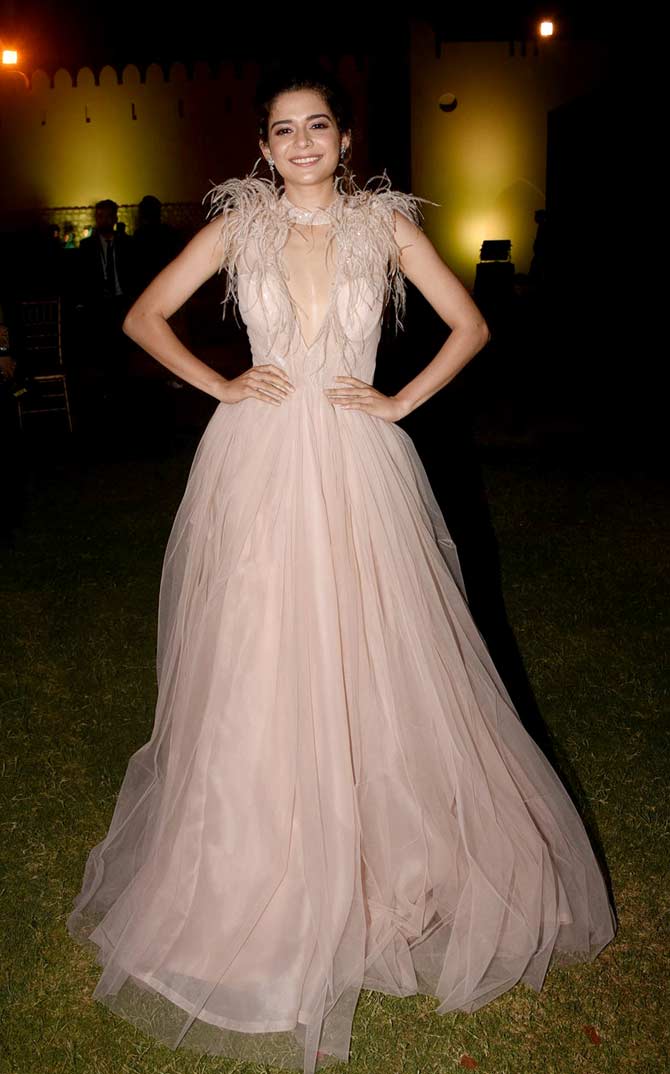 Mithila Palkar looked exquisite in a soft pink tulle gown. The actress was all smiles while being clicked at the event.
