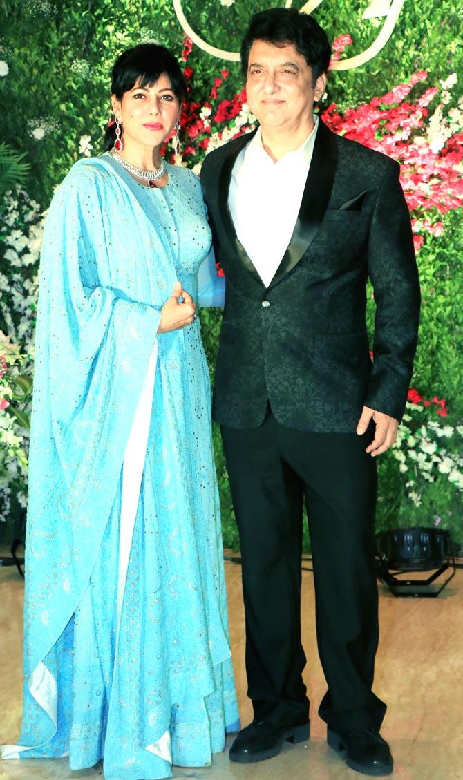 Sajid Nadiadwala with wife Wardha Nadiadwala at Akshay Gada's wedding reception held in Mumbai.