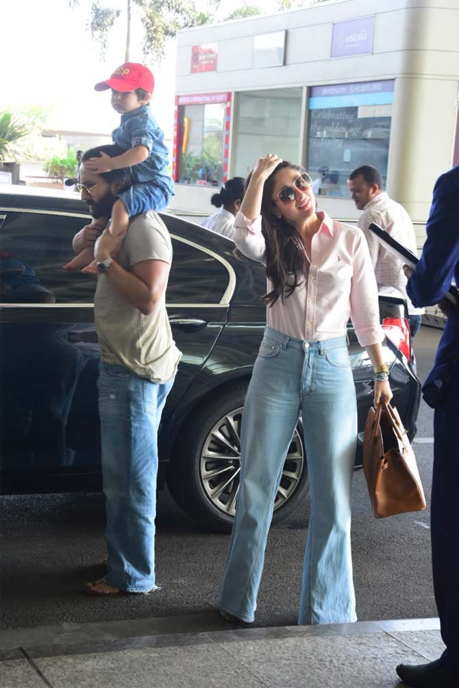Taimur Ali Khan, Saif Ali Khan and Kareena Kapoor were snapped at the Mumbai airport. Looks like the Pataudi family seems to be out on a vacation once again! All pictures/Yogen Shah