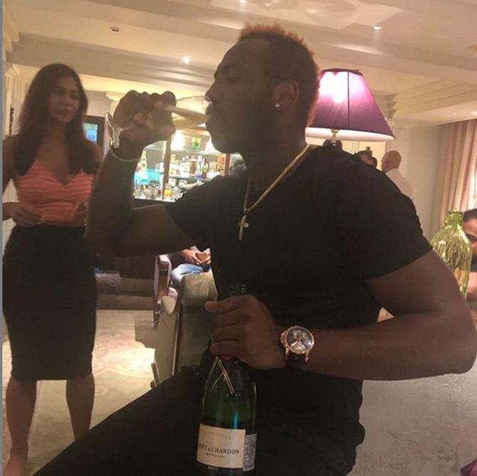 In picture: Andre Russell with his KKR teammates in 2020