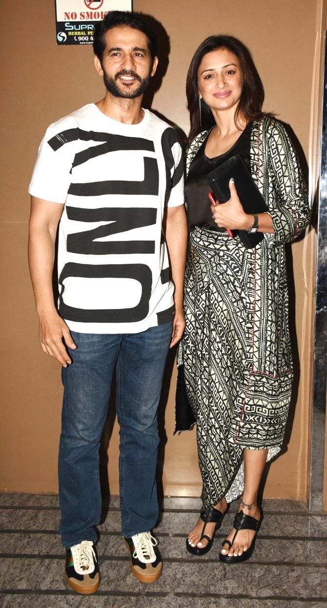 Telly couple Hiten Tejwani and Gauri Pradhan were snapped at the special screening of Kalank at Juhu multiplex.