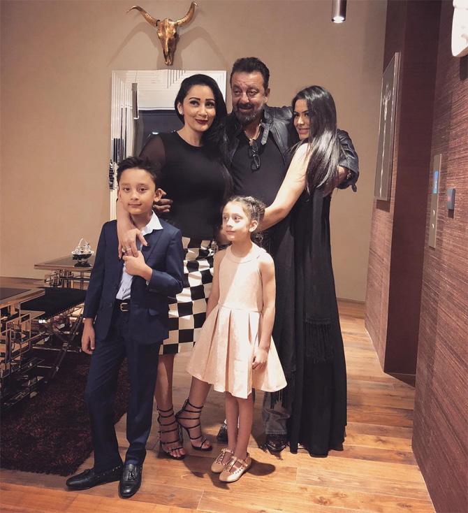 Sanjay Dutt is now content in his life and is leading a happy life and this picture is proof enough! Pictured: Sanjay Dutt with his daughter Trishala, wife Maanayata Dutt and kids Shahraan and Iqra