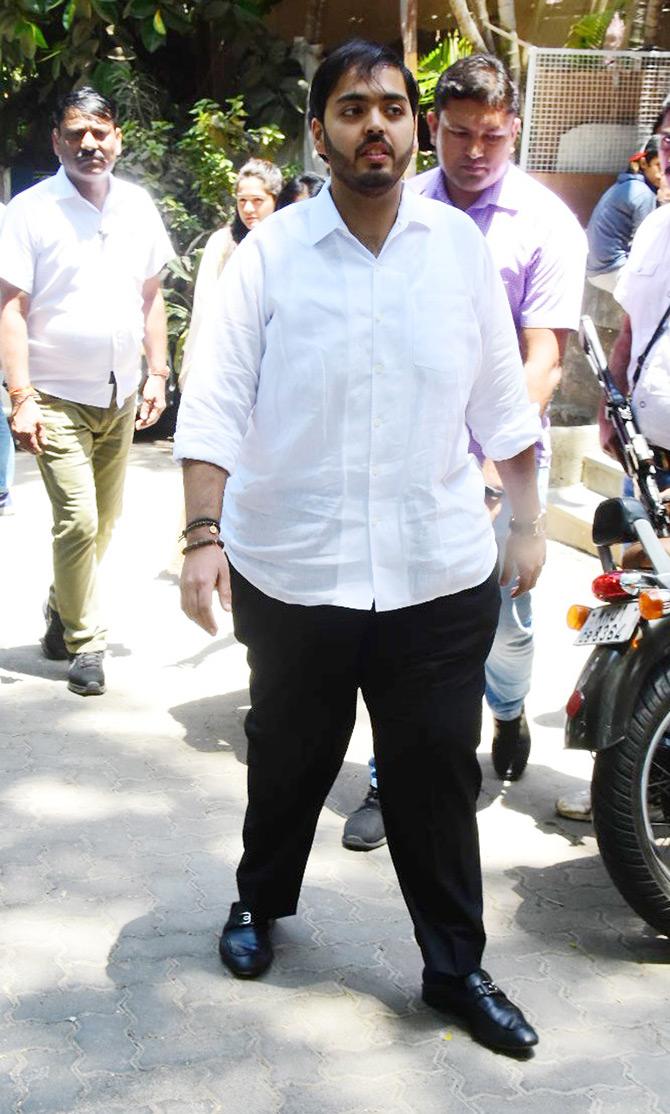 In pic: Anant Ambani walks towards his car after attending a store launch in Bandra with Radhika Merchant.