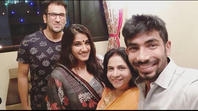 Jasprit Bumrah posted this picture along with his family and captioned it, 