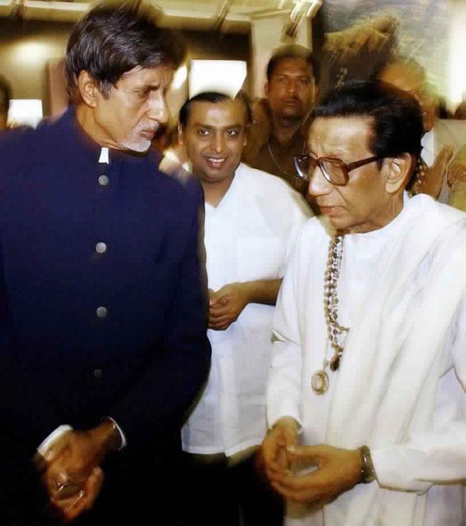 In picture: Late Shiv Sena Chief Bal Thackeray speaks to actor Amitabh Bachchan while Mukesh Ambani looks on at the inauguration of Thackeray's son Udhav's aerial photographic exhibition on the 'Forts of Maharashtra' at the Jahangir Art gallery in Bombay, January 19, 2004