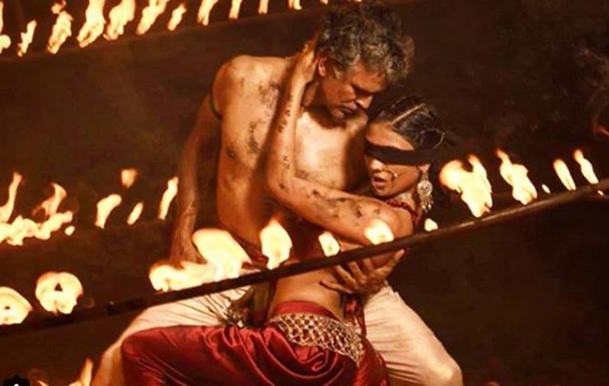 The glamorous model from Mumbai set the screen on fire when she aced a photoshoot with veteran model Milind Soman. Urvi's poses and catwalks won her a lot of praises from the judges of the show.
In pic: Urvi Shetty in tandem with ace model Milind Soman.