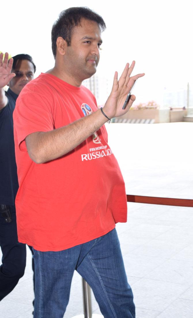 Isha Ambani was accompanied by husband Anand Piramal who sported casual attire at the Mumbai airport. Anand Piramal wore jeans and a red tee shirt.