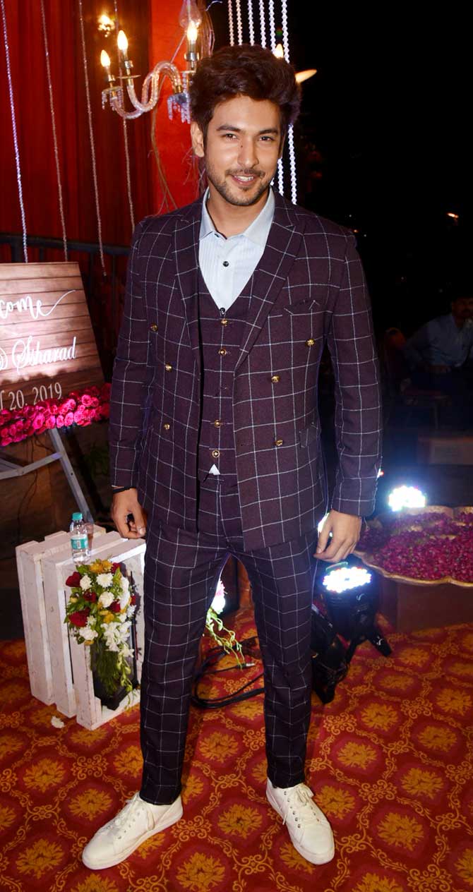 Shivin Narang opted for a checkered pantsuit for Ssharad Malhotra and Rpici Bhatia's wedding ceremony held at a popular club in Andheri, Mumbai.