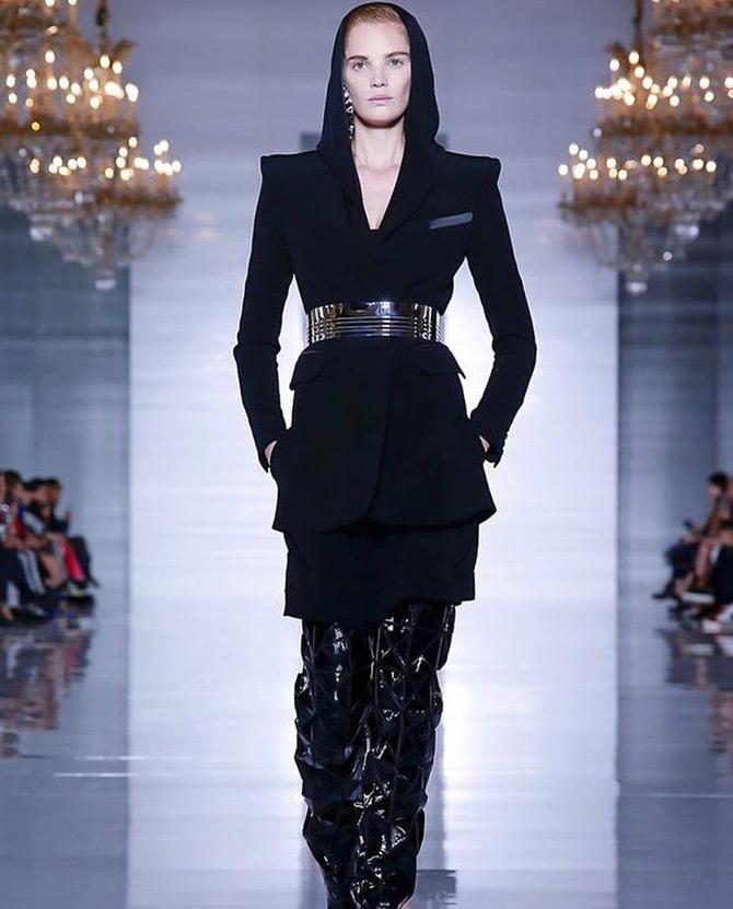 At 17, Alexina Graham started modelling to pay for her University fees. It was only until she won the competition that Graham took up modelling full time at the age of 18.
In pic: Alexina Graham walks the runway in an all-black attire at Paris, France.
