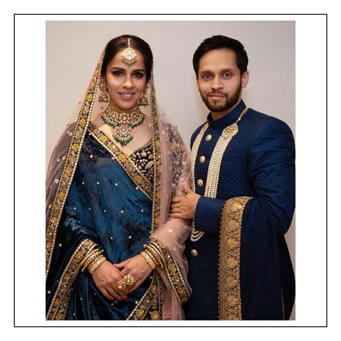 Tennis ace Saina Nehwal's outfits were designed by Sabyasachi Mukherji. Saina wore a rich indigo velvet lehenga. Sabyasachi took to his Instagram page to share the details of the outfits. He wrote, 