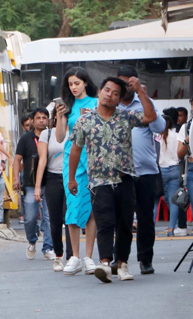 Ananya Panday was spotted at FilmCity in Goregaon, Mumbai. Ananya looked pretty in her blue dress as she was clicked shooting at the studios. Chunky Panday and Bhavana's daughter will be making her Bollywood debut with Punit Malhotra's Student Of The Year 2 which also stars Tiger Shroff and Tara Sutaria. All pictures/Yogen Shah