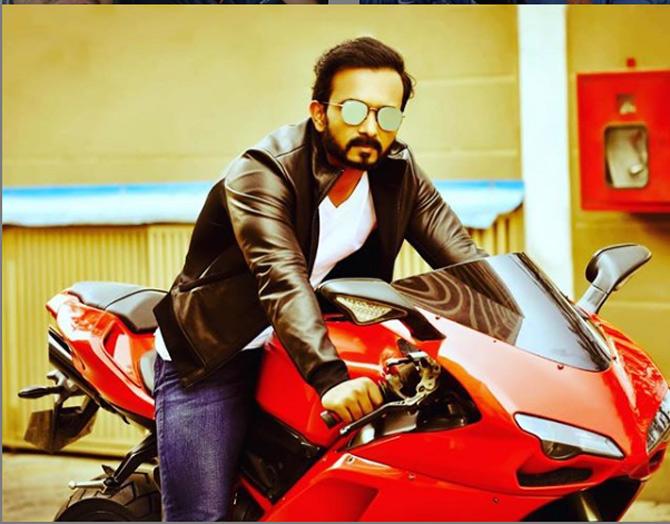 Kedar Jadhav, who is a huge fan of Bollywood star Salman Khan, poses just like him in this picture on a bike.