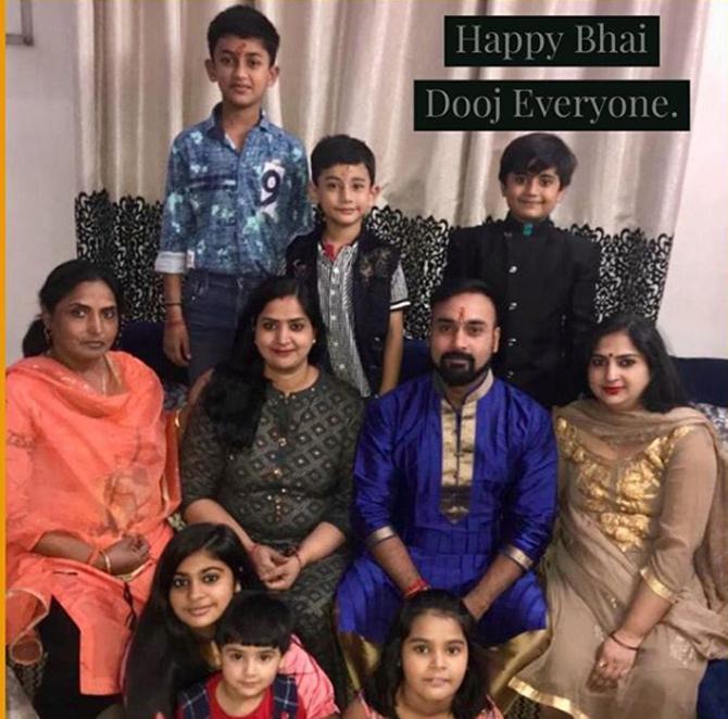 Amit Mishra posted this picture where he is seen celebrating the Indian festival of Bhai Dooj with his sisters and brothers.